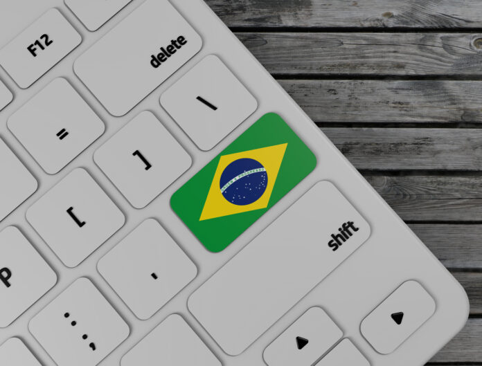 Brazil,Flag,Enter,Key,On,White,Keyboard,,On,Wood,Background.